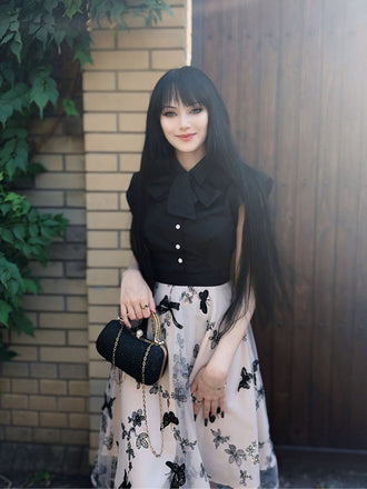 She slips into this Black 1950s Butterfly Patchwork Vintage Dress and suddenly it's a 1950s daydream