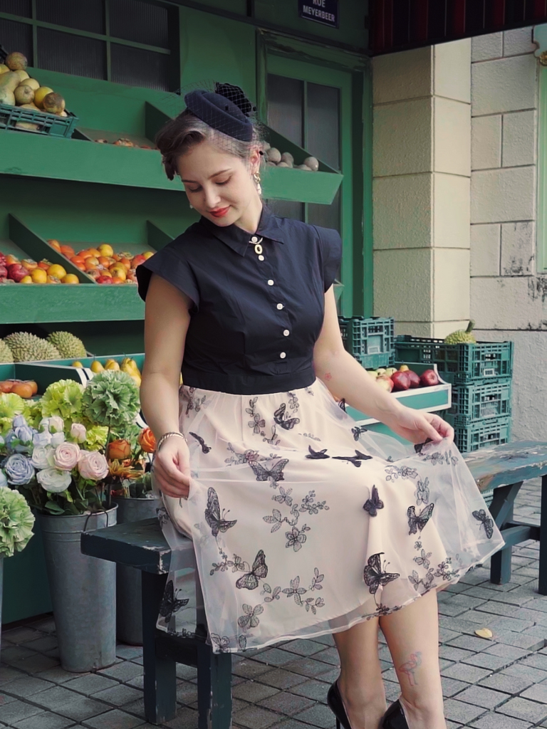 She slips into this Black 1950s Butterfly Patchwork Vintage Dress and suddenly it's a 1950s daydream