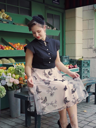 She slips into this Black 1950s Butterfly Patchwork Vintage Dress and suddenly it's a 1950s daydream