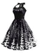 Black 1950s Christmas Halter Swing Dress — vintage elegance for the modern woman