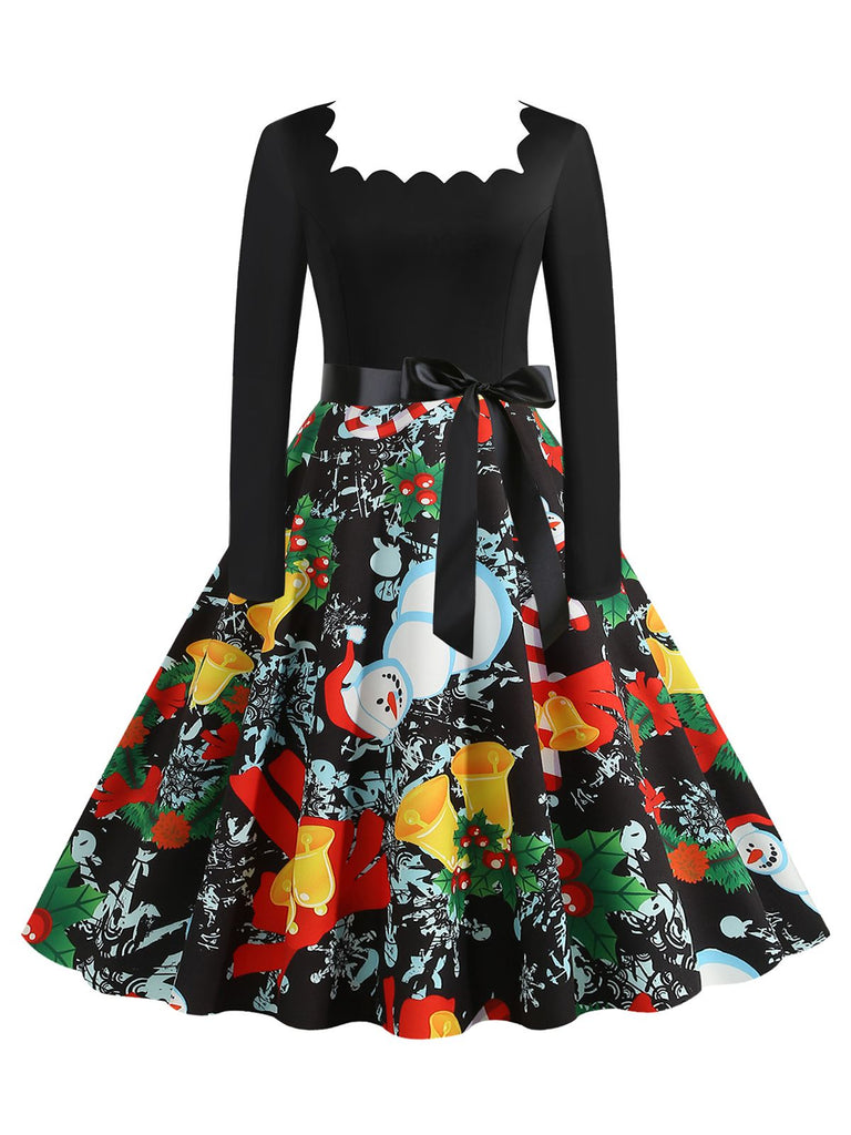 She slips into this Black 1950s Christmas Print Belted Dress and suddenly it's a 1950s daydream