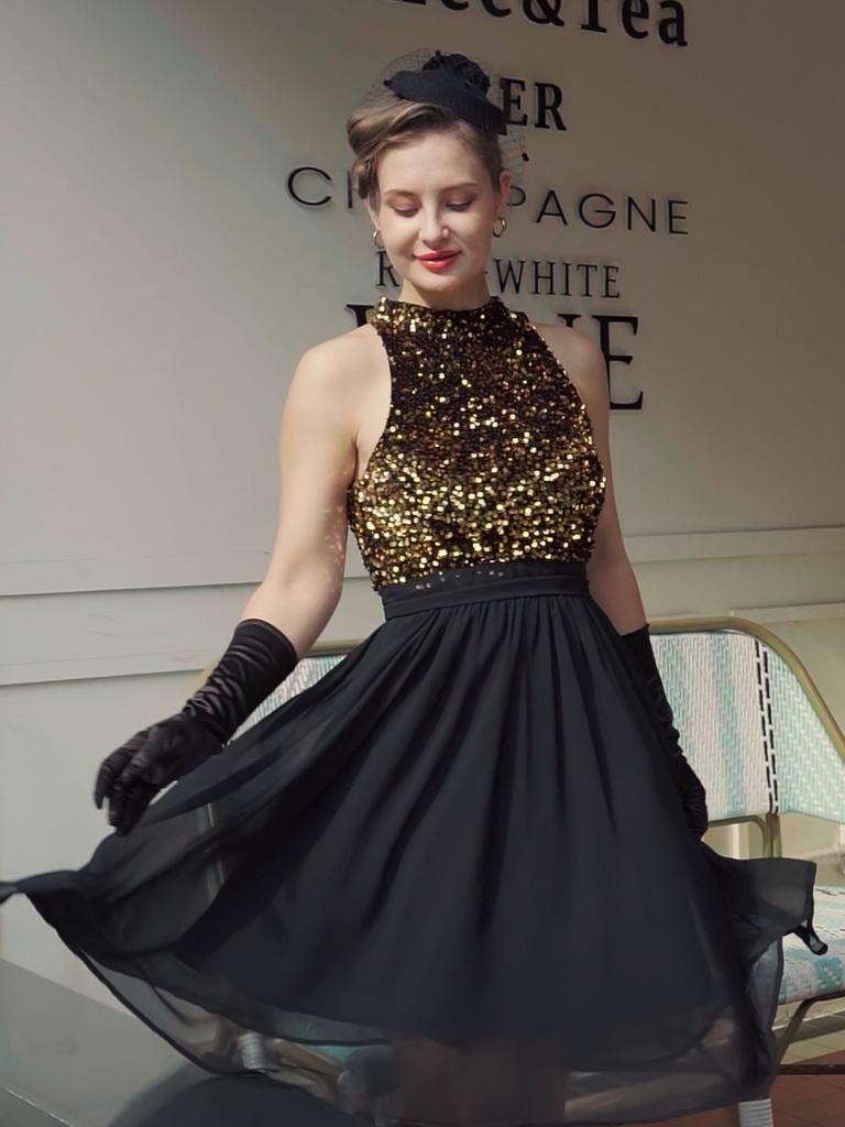 She slips into this Black 1950s Gold Glitter Patchwork Dress and suddenly it's a 1950s daydream