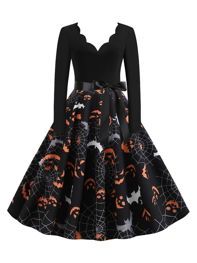 She slips into this Black 1950s Halloween Petal Collar Dress and suddenly it's a 1950s daydream