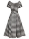 Black 1950s Houndstooth Short Sleeve Belted Dress — vintage elegance for the modern woman