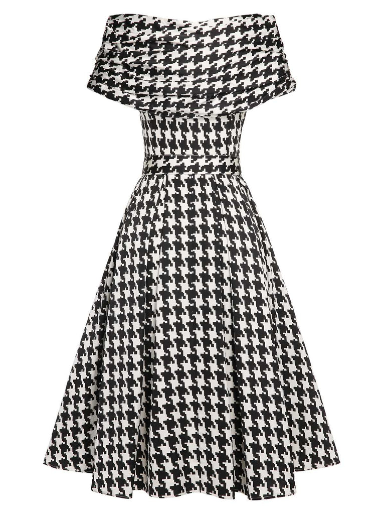 Black 1950s Houndstooth Short Sleeve Belted Dress — vintage elegance for the modern woman