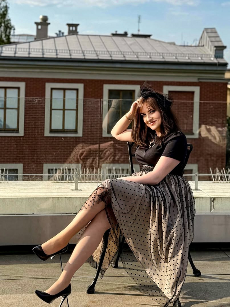 She slips into this Black 1950s Polka Dot Swing Dress and suddenly it's a 1950s daydream