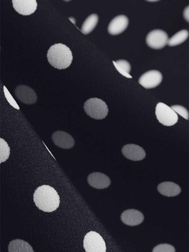 Black 1950s Polka Dots Ruffles Dress — the kind of 1950s dress that makes strangers smile