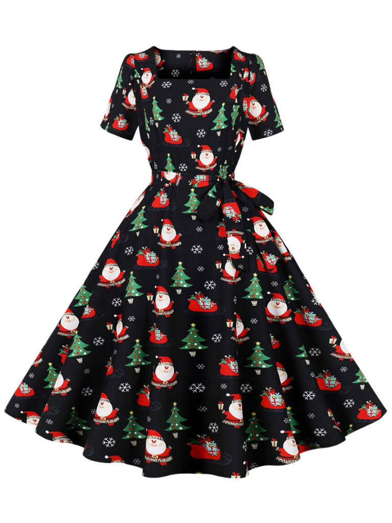 She slips into this Black 1950s Santa Claus Christmas Dress and suddenly it's a 1950s daydream