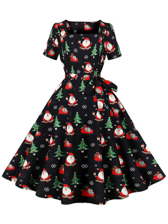 She slips into this Black 1950s Santa Claus Christmas Dress and suddenly it's a 1950s daydream