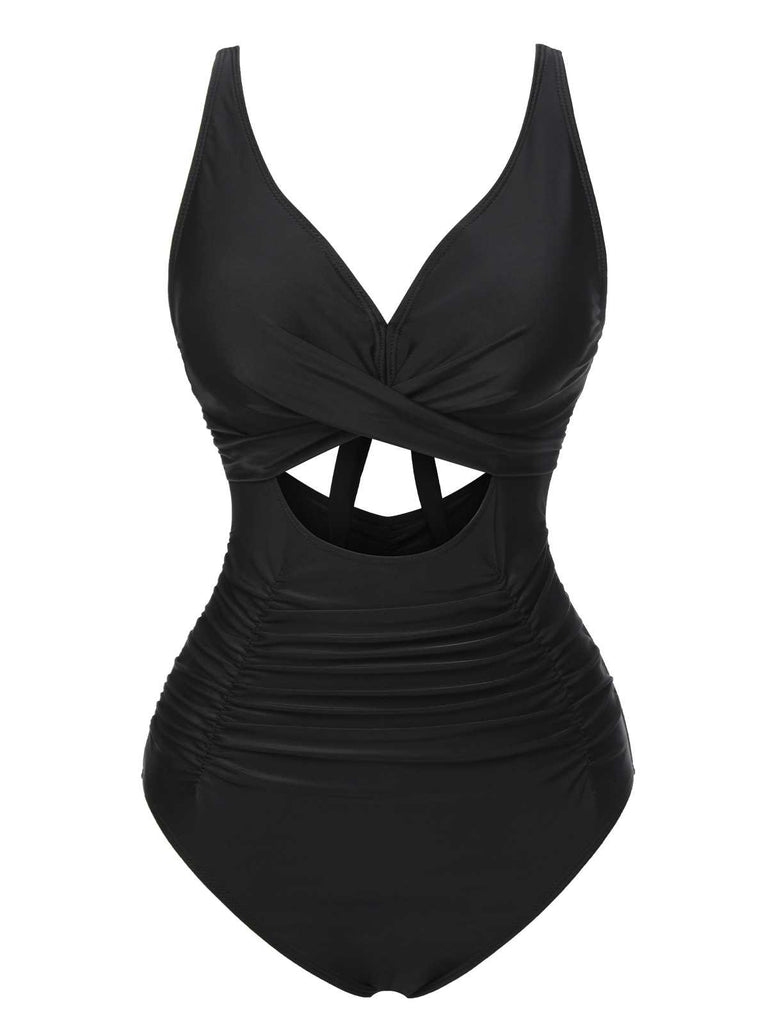 She's wearing Black 1950s Strap Hollow One-Piece Swimsuit and the whole beach remembers the 1950s