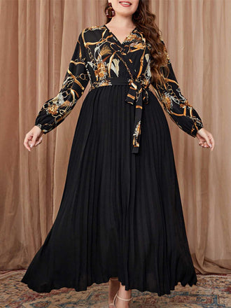 She slips into this Black 1950s V-Neck Tie Pleated Dress and suddenly it's a 1950s daydream
