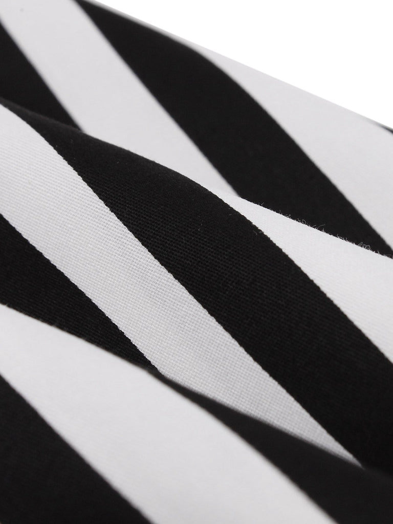 Black 1950s Vertical Stripes Halter Dress — the kind of 1950s dress that makes strangers smile