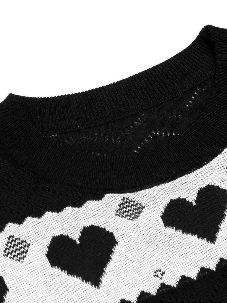 She slips into this Black 1960s Contrasting Heart Knitting Dress and suddenly it's a 1960s daydream