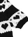 Black 1960s Contrasting Heart Knitting Dress: where 1960s romance meets her modern spirit