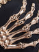 Black 1960s Gothic Punk Skeleton Hand Rivet Top - vintage fashion, retro style, classic black
