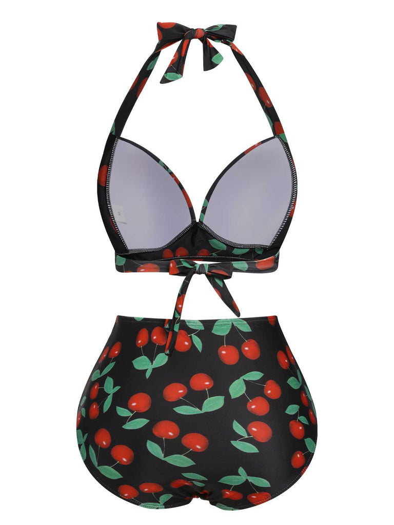This Black 1960s Halter Cherry Swimsuit carries 1960s vacation dreams in every stitch