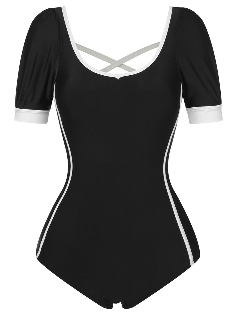 She's wearing Black 1960s Puff Sleeves One-Piece Swimsuit and the whole beach remembers the 1960s
