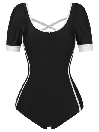 She's wearing Black 1960s Puff Sleeves One-Piece Swimsuit and the whole beach remembers the 1960s