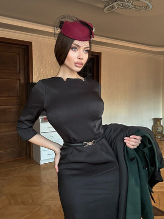 She slips into this Black 1960s Solid Boat Neck Wrap Dress and suddenly it's a 1960s daydream