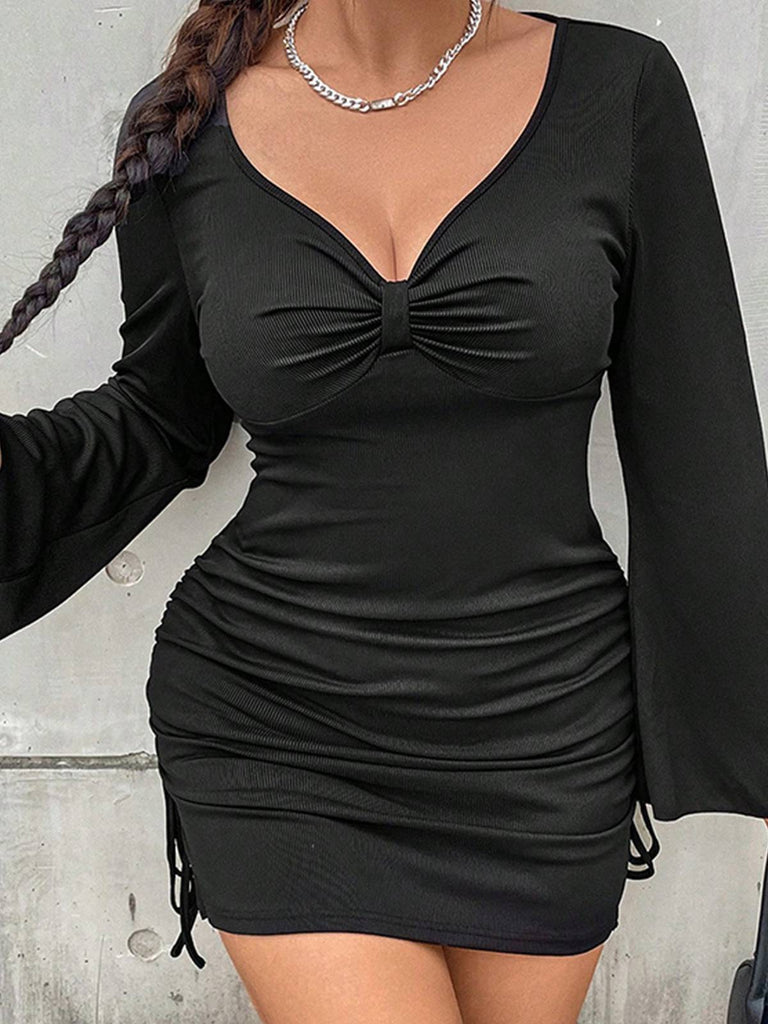 She slips into this Black 1960s Solid Drawstring Pencil Dress and suddenly it's a 1960s daydream