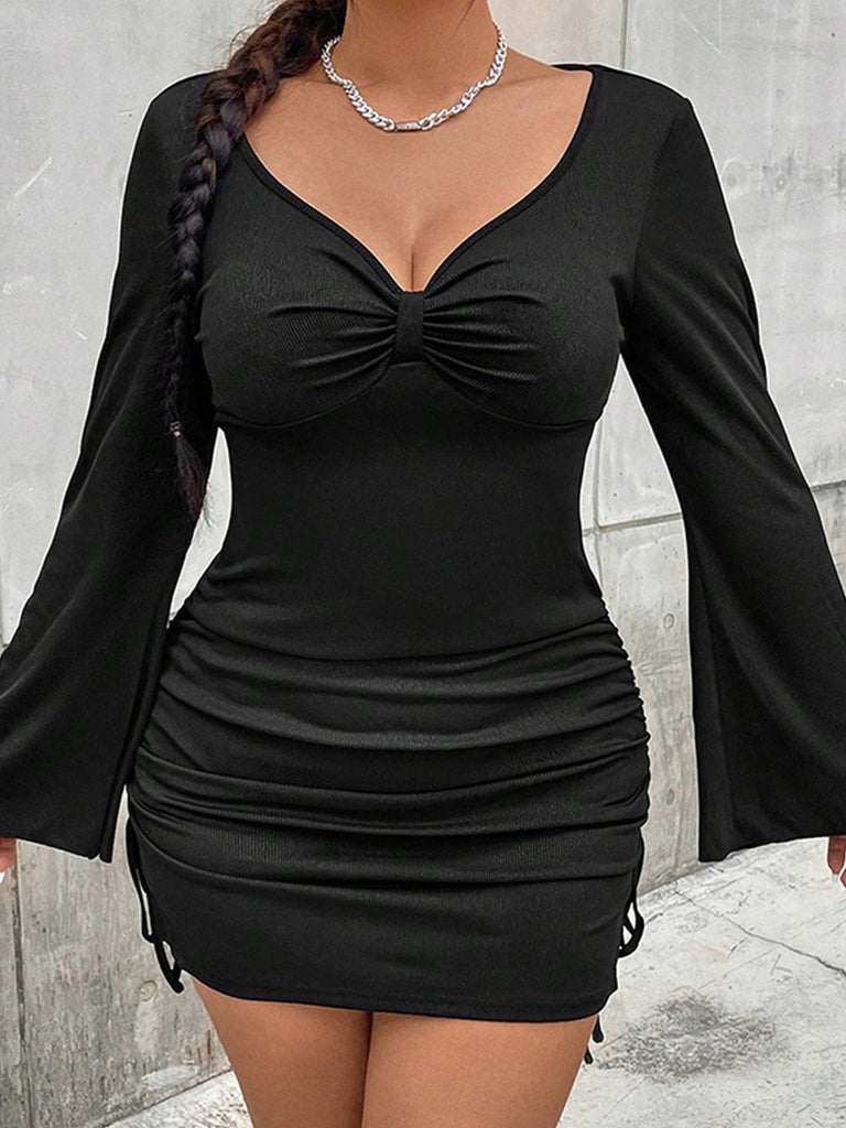 She slips into this Black 1960s Solid Drawstring Pencil Dress and suddenly it's a 1960s daydream