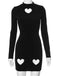 She slips into this Black 1960s Solid Heart Cut Out Dress and suddenly it's a 1960s daydream