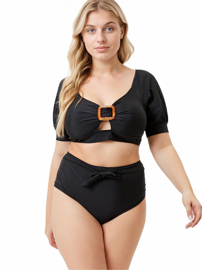 This Black 1960s Solid Hollow Puff Swimsuit carries 1960s vacation dreams in every stitch