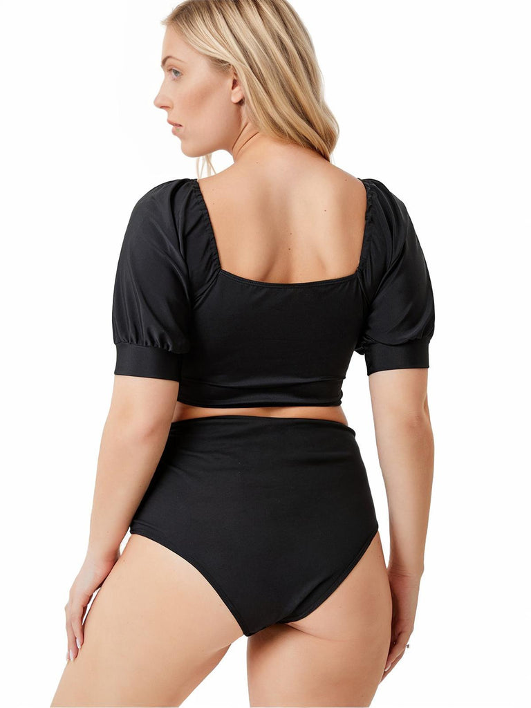 Black 1960s Solid Hollow Puff Swimsuit — because 1960s glamour never goes out of style