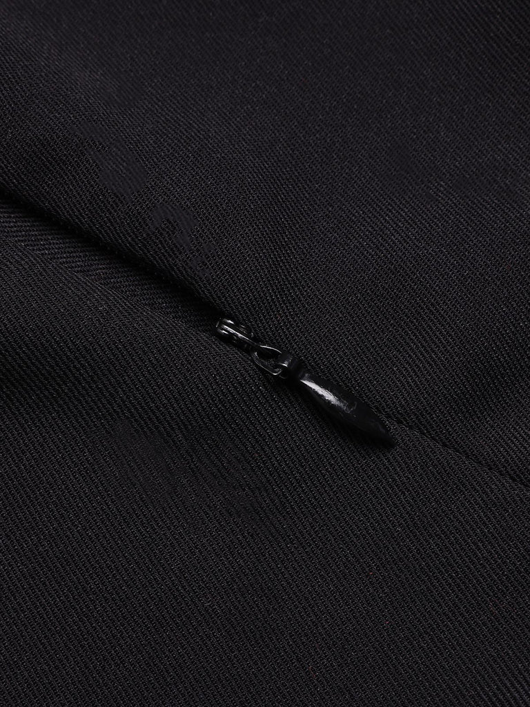 This Black 1960s Tie Neck Plaids Bow Dress wraps her in 1960s elegance, one twirl at a time