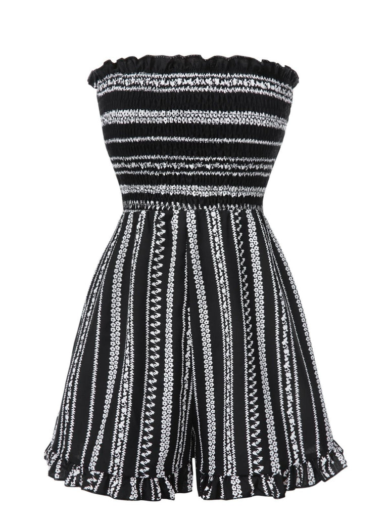 She finds her 1970s story in this Black 1970s Boho Striped Strapless Romper