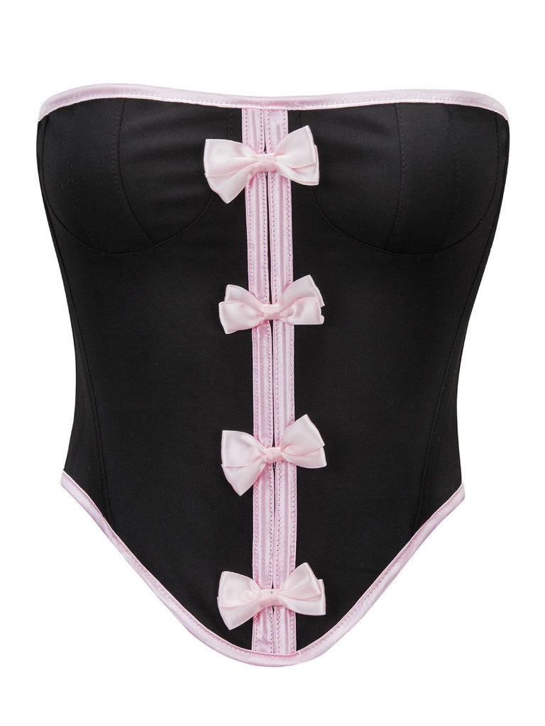 She slips into Black 1980s Steampunk Bowknots Bandeau Corset and channels 1980s screen sirens