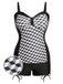She's wearing Black & White 1960s Geometric Lace-Up Swimsuit and the whole beach remembers the 1960s