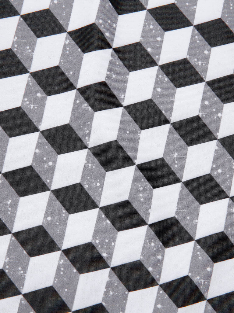 Black & White 1960s Geometric Lace-Up Swimsuit — because 1960s glamour never goes out of style