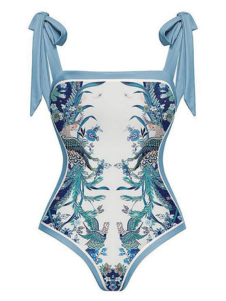 She's wearing Blue 1930s Straps Reversible Swimsuit and the whole beach remembers the 1930s
