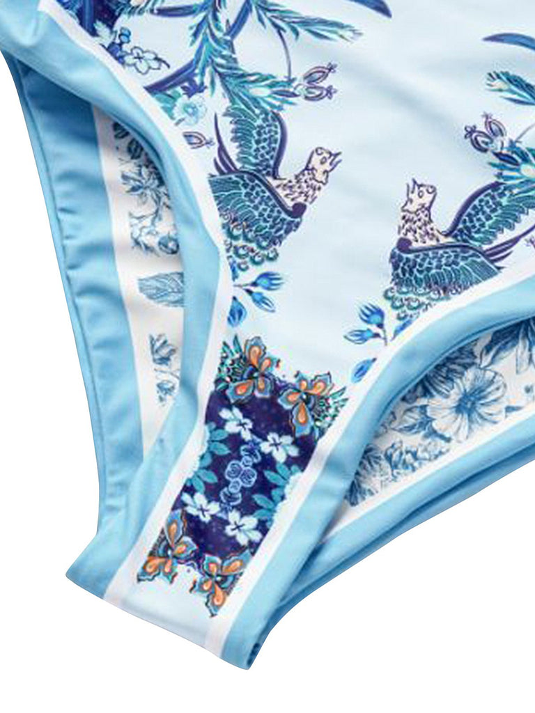 She's wearing Blue 1930s Straps Reversible Swimsuit and the whole beach remembers the 1930s