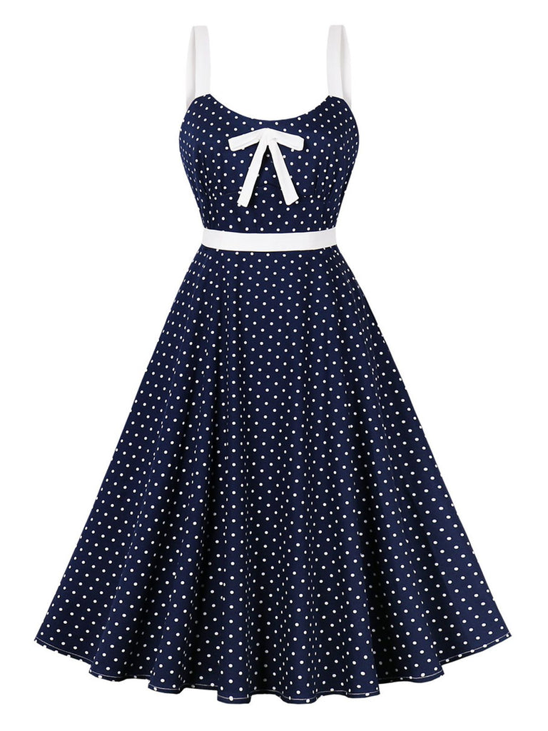 She slips into this Blue 1940s Strap Polka Dot Bow Belted Dress and suddenly it's a 1940s daydream