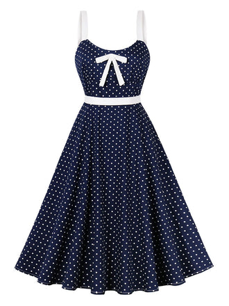 She slips into this Blue 1940s Strap Polka Dot Bow Belted Dress and suddenly it's a 1940s daydream