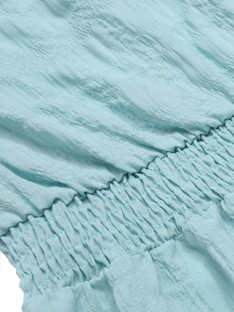 Blue 1950s Bandeau Ruffles Belted Romper — 1950s elegance in the palm of her hand