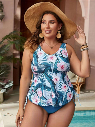 She's wearing Blue 1950s Floral Swimsuit and the whole beach remembers the 1950s