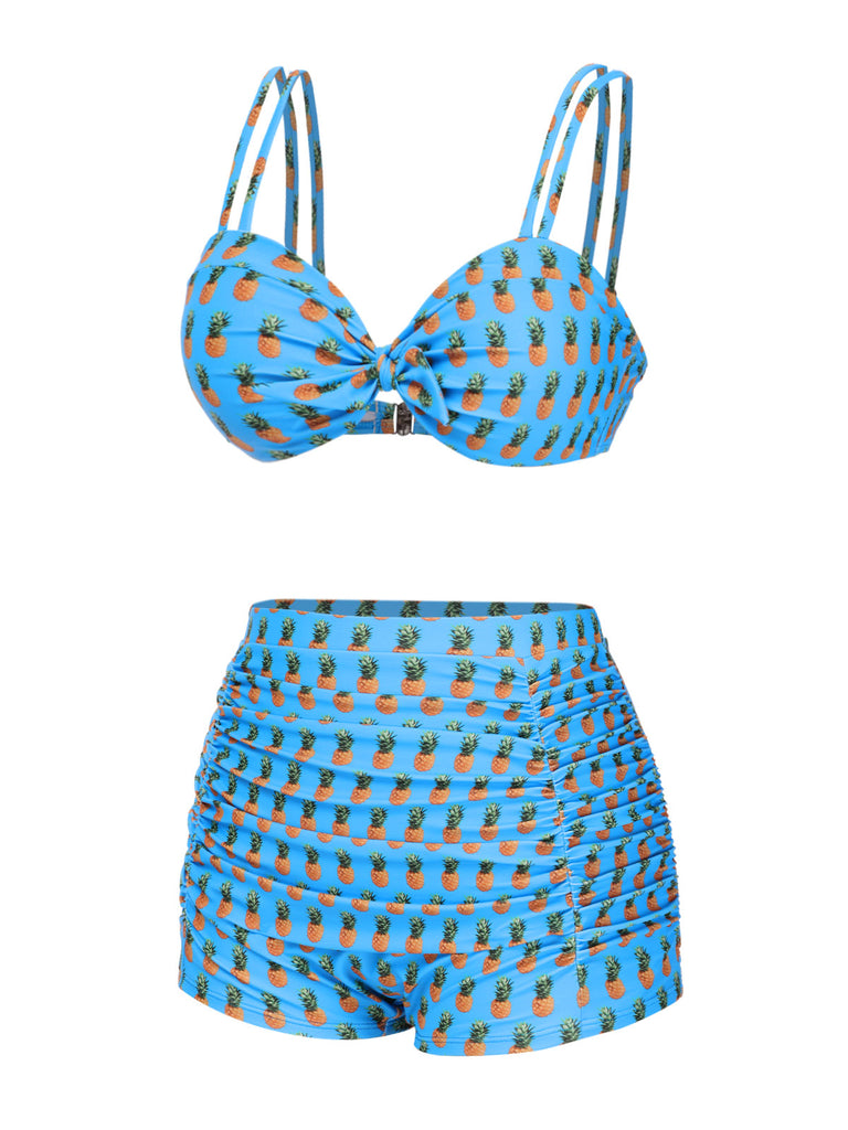 This Blue 1950s Pineapple Strap Bow Swimsuit carries 1950s vacation dreams in every stitch