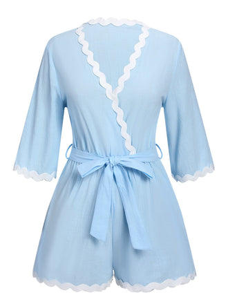 She adds this Blue 1950s V-Neck Solid Belted Romper and suddenly it's 1950s perfection