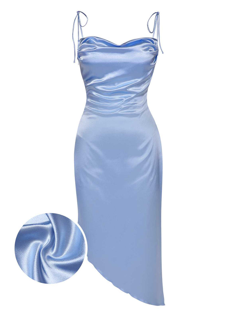 She slips into this Blue 1960s Spaghetti Strap Irregular Hem Satin Dress and suddenly it's a 1960s daydream