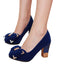 She finds her vintage story in this Bow Suede Chunky Heel Shoes