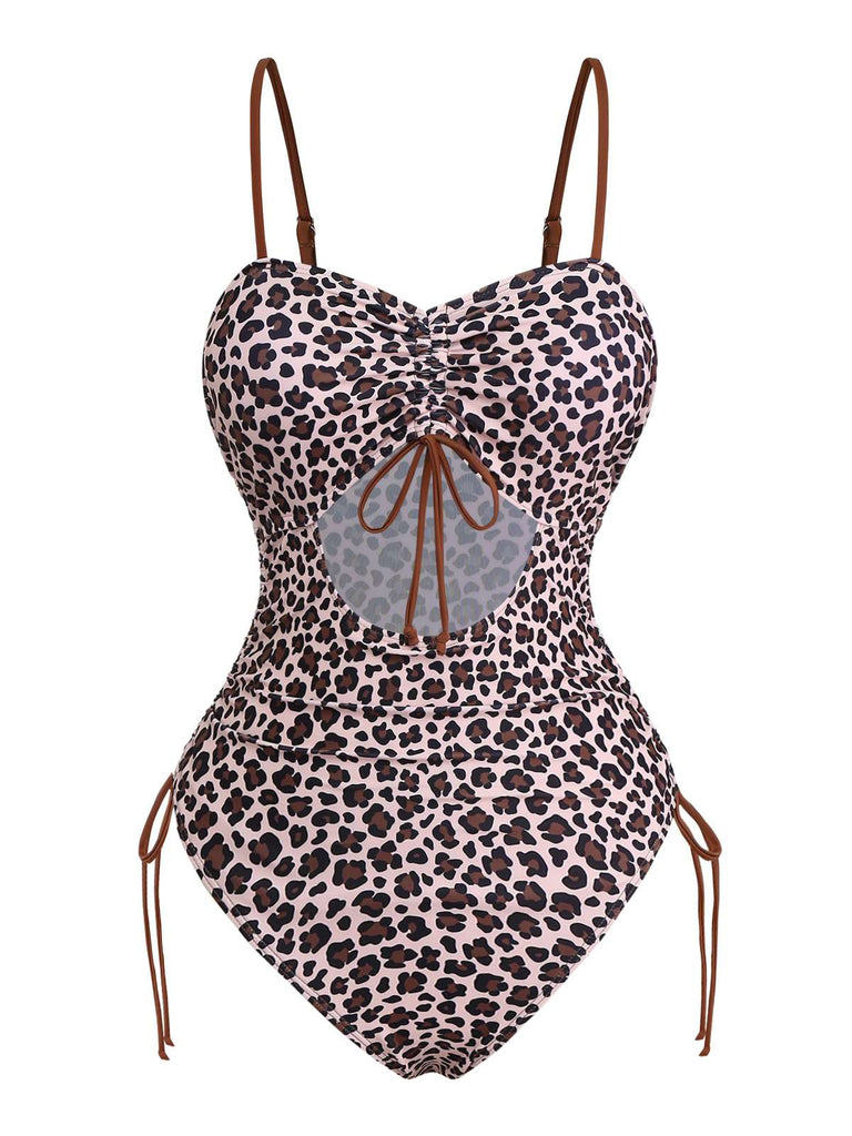 She's wearing Brown 1940s Leopard Hollow Drawstring Swimsuit and the whole beach remembers the 1940s