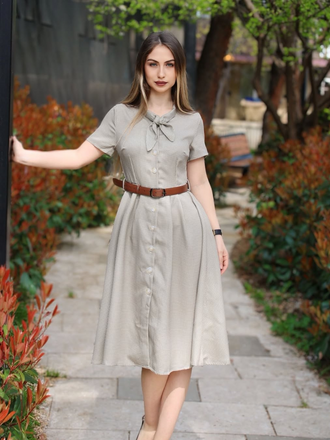 She slips into this Brown 1940s Small Windowpane Plaid Dress and suddenly it's a 1940s daydream
