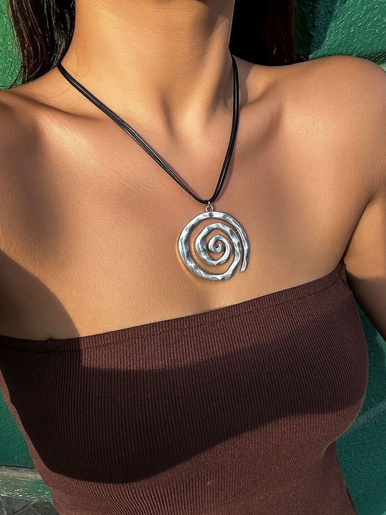 She adds this Conch Starfish Pendant Leather Cord Necklace and suddenly it's vintage perfection
