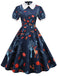 She slips into this Dark Blue 1950s Forest Puff Lapel Dress and suddenly it's a 1950s daydream