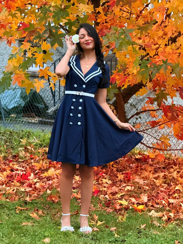 She slips into this Dark Blue 1950s Sailor Style Double Breasted Dress and suddenly it's a 1950s daydream
