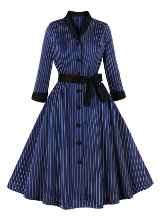 She slips into this Dark Blue 1950s Striped Patchwork Belted Dress and suddenly it's a 1950s daydream