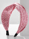 This Fabric Wide Brim Polka Dot Cross Headband whispers vintage secrets to those who notice